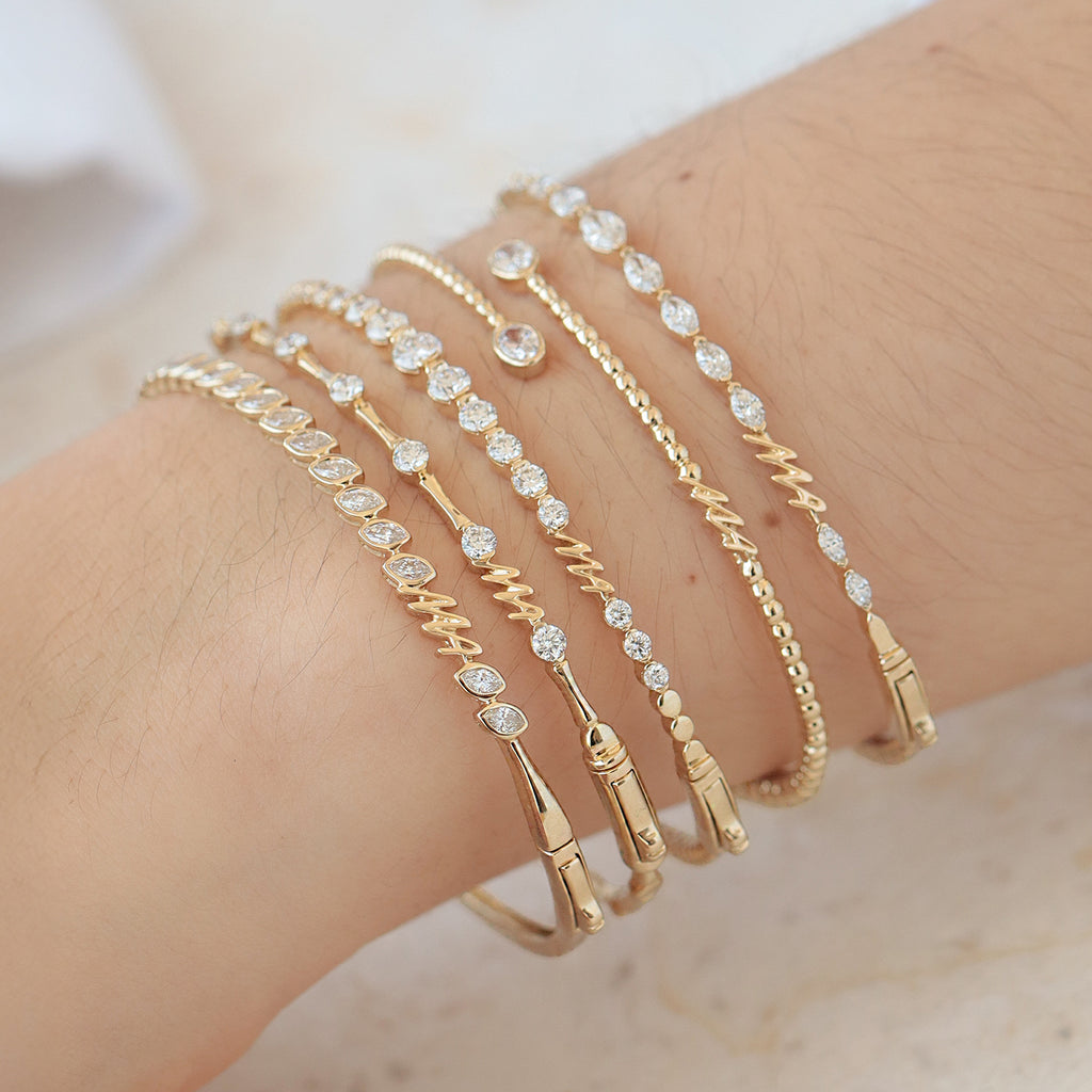 Brazalete Astra Oro Amarillo 14K con Diamantes.