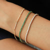 Brazalete Tennis Oro Amarillo 14K con Esmeraldas.