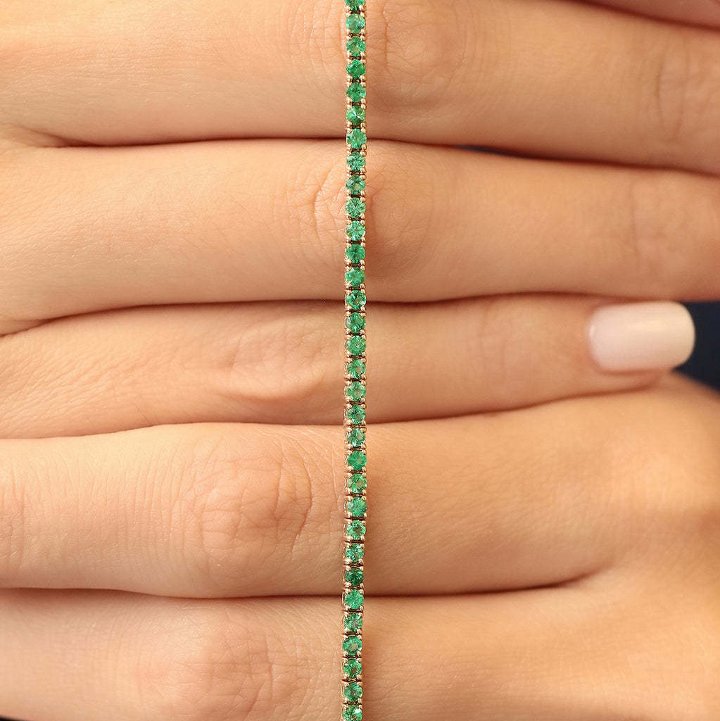 Brazalete Tennis Oro Amarillo 14K con Esmeraldas.