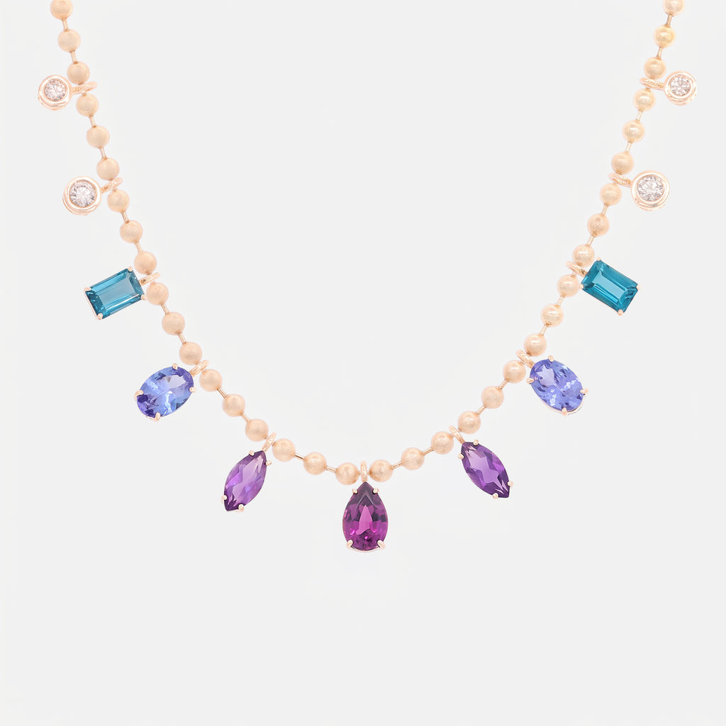 Cadena Lumina Mauve Oro Amarillo 14K con Tanzanitas, Granate, Amatista, Topacio y Diamantes.