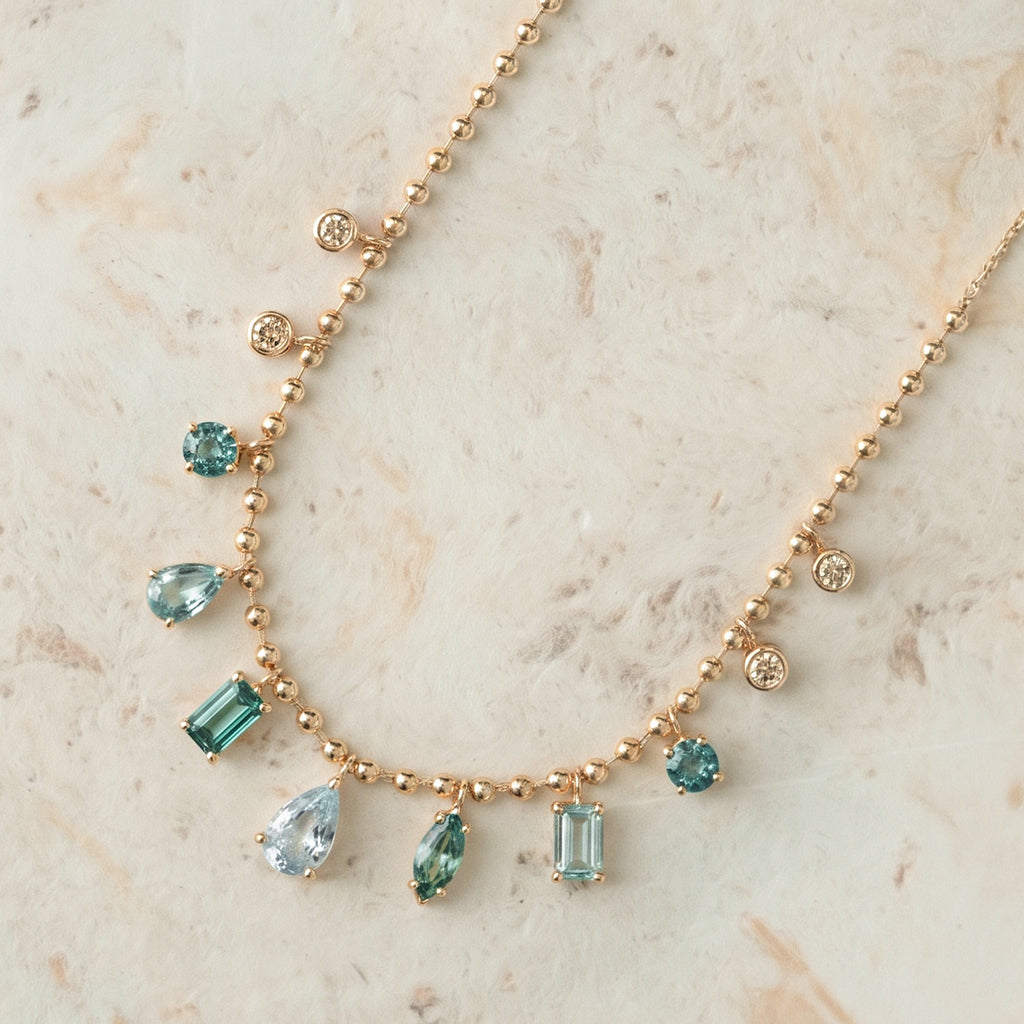 Cadena Lumina Cyan Oro Amarillo14K con Turmalina, Zafiros y Diamantes.