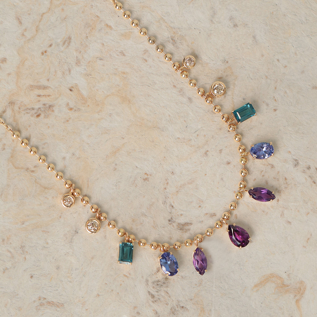 Cadena Lumina Mauve Oro Amarillo 14K con Tanzanitas, Granate, Amatista, Topacio y Diamantes.