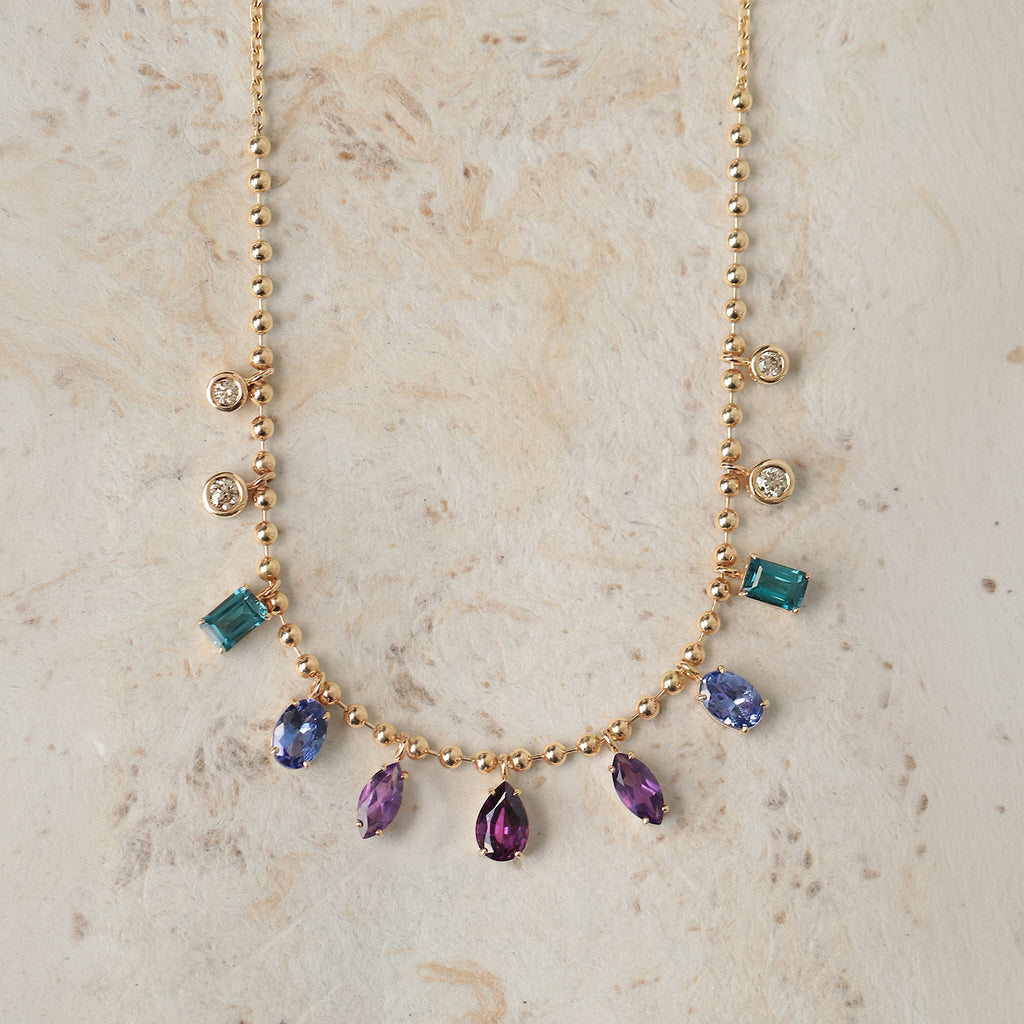 Cadena Lumina Mauve Oro Amarillo 14K con Tanzanitas, Granate, Amatista, Topacio y Diamantes.