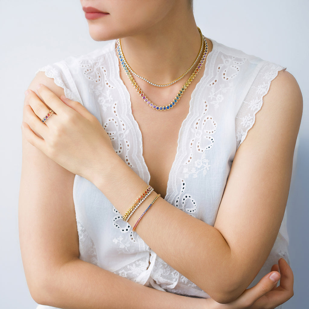 Brazalete Zinnia Oro Amarillo 18K con Zafiros.
