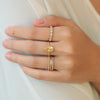 Anillo Elysa Oro Amarillo 14K con Topacio Imperial.
