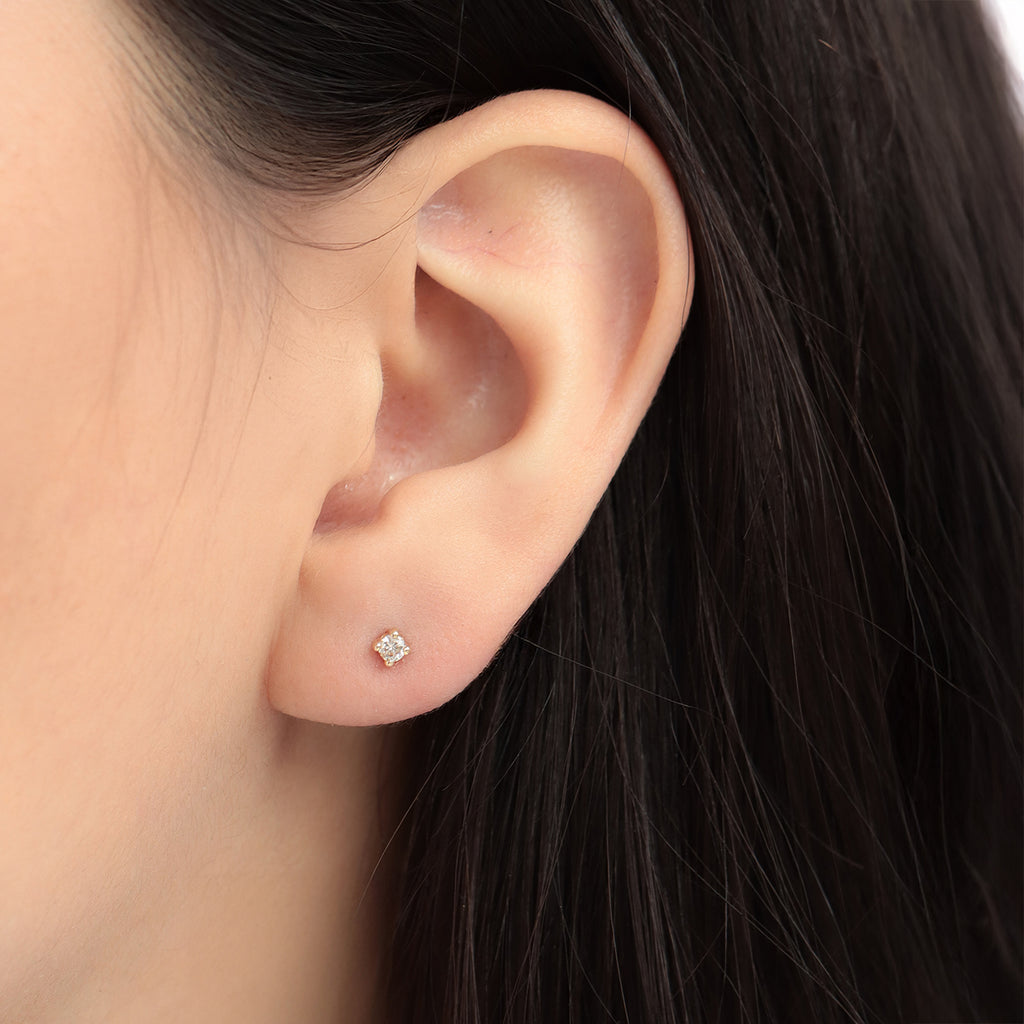 Studs Orbit Oro Amarillo 14K con Diamantes.