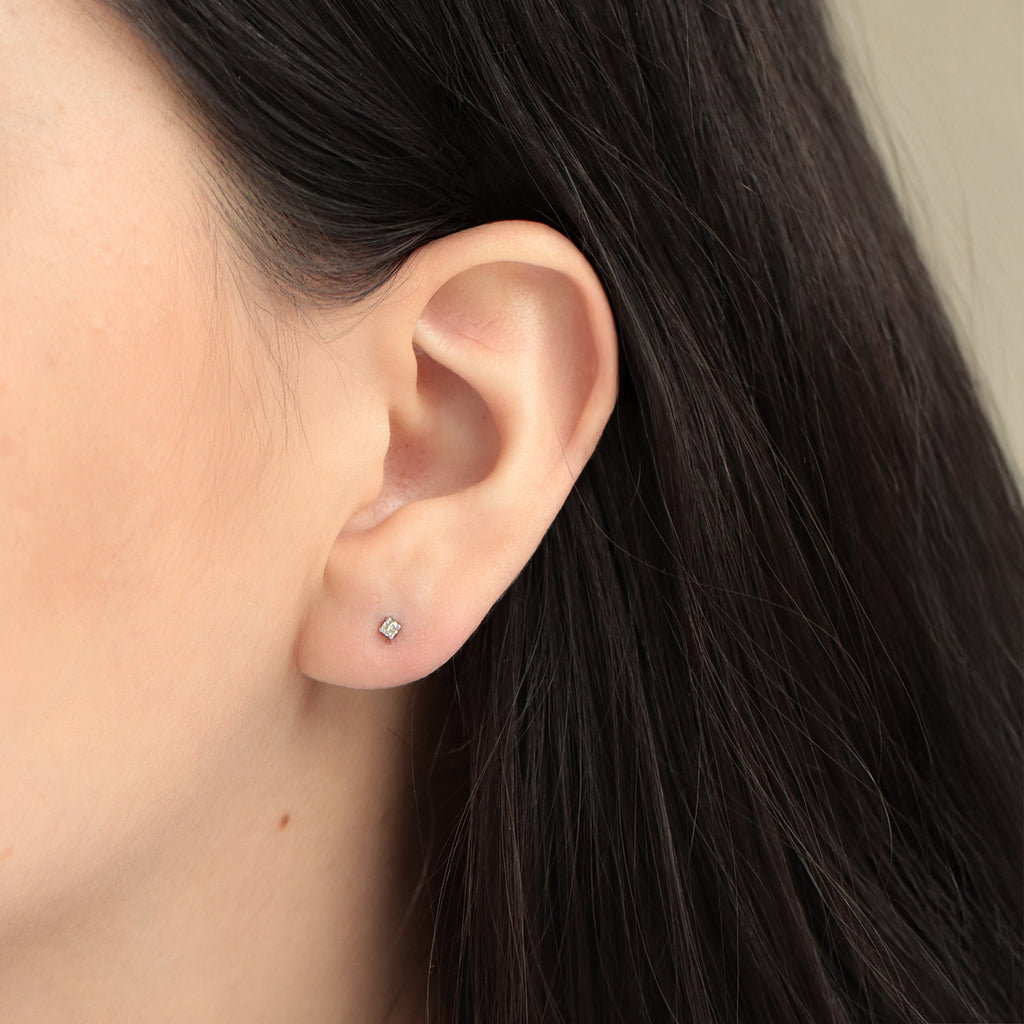 Studs Orbit Oro Blanco 14K con Diamantes.