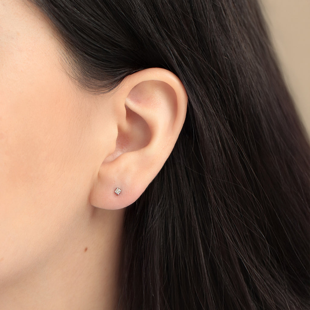 Studs Orbit Oro Blanco 14K con Diamantes.