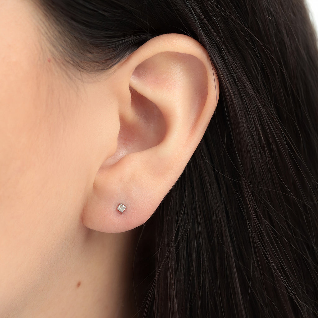 Studs Orbit Oro Blanco 14K con Diamantes.