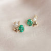 Aretes Galaxy Emerald Oro Amarillo 14K con Esmeraldas y Diamantes.